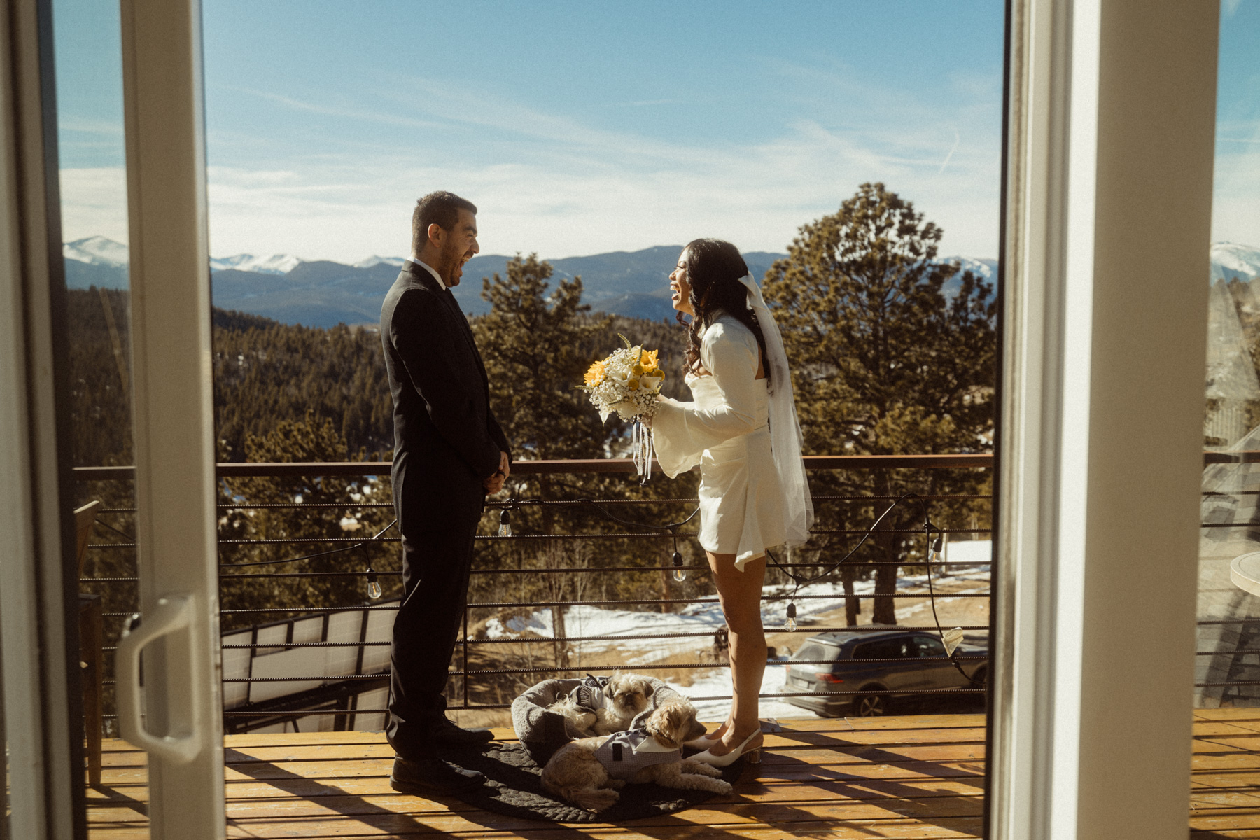 Two people getting married in colorado by self solemnizing on the deck of their airbnb.