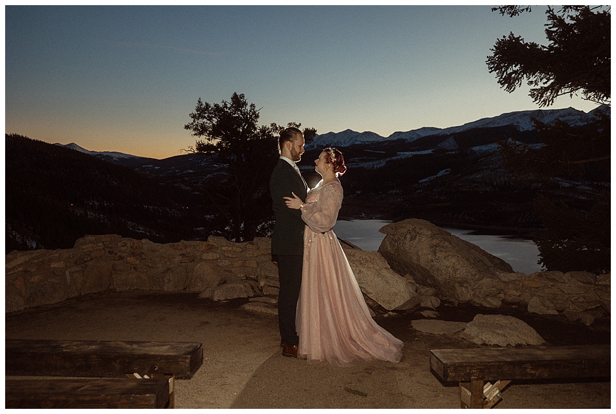 A couple shares a first dance after eloping at Sapphire Point Overlook.