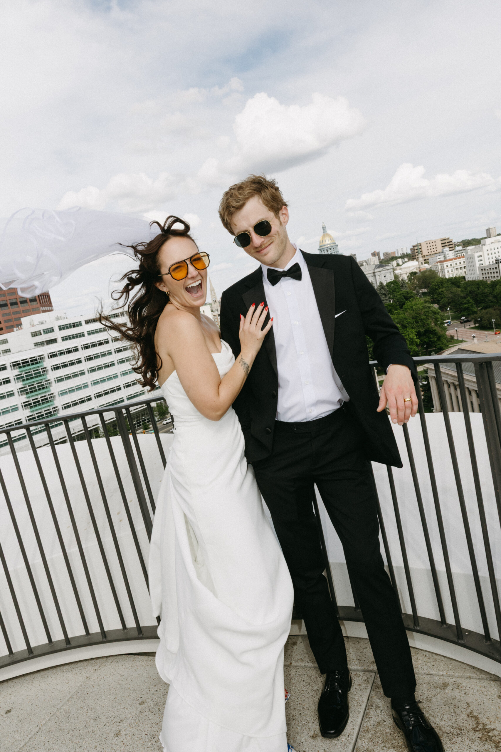 A couple performs a self-solemnization ceremony on the Populus a rooftop in Denver.