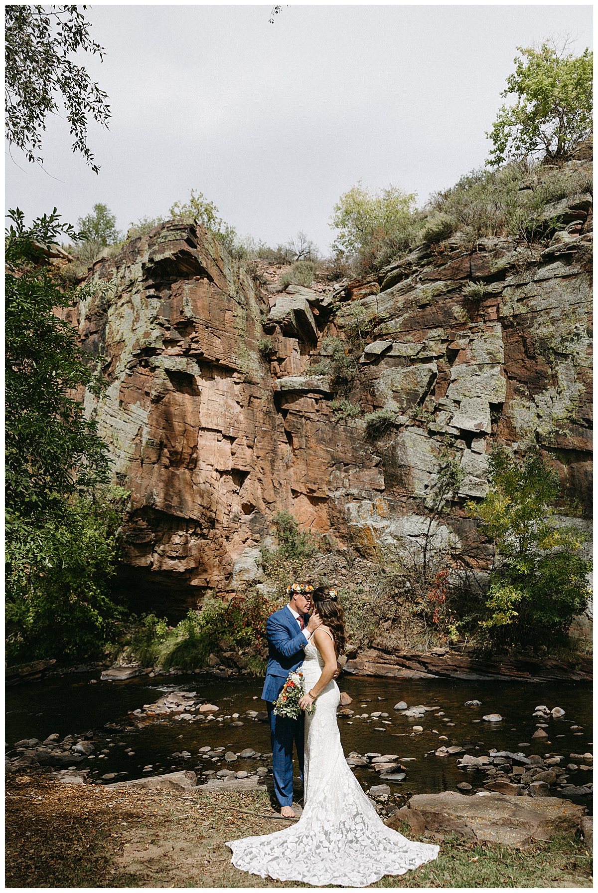 Couple portraits along the river during a fall wedding at Planet Bluegrass