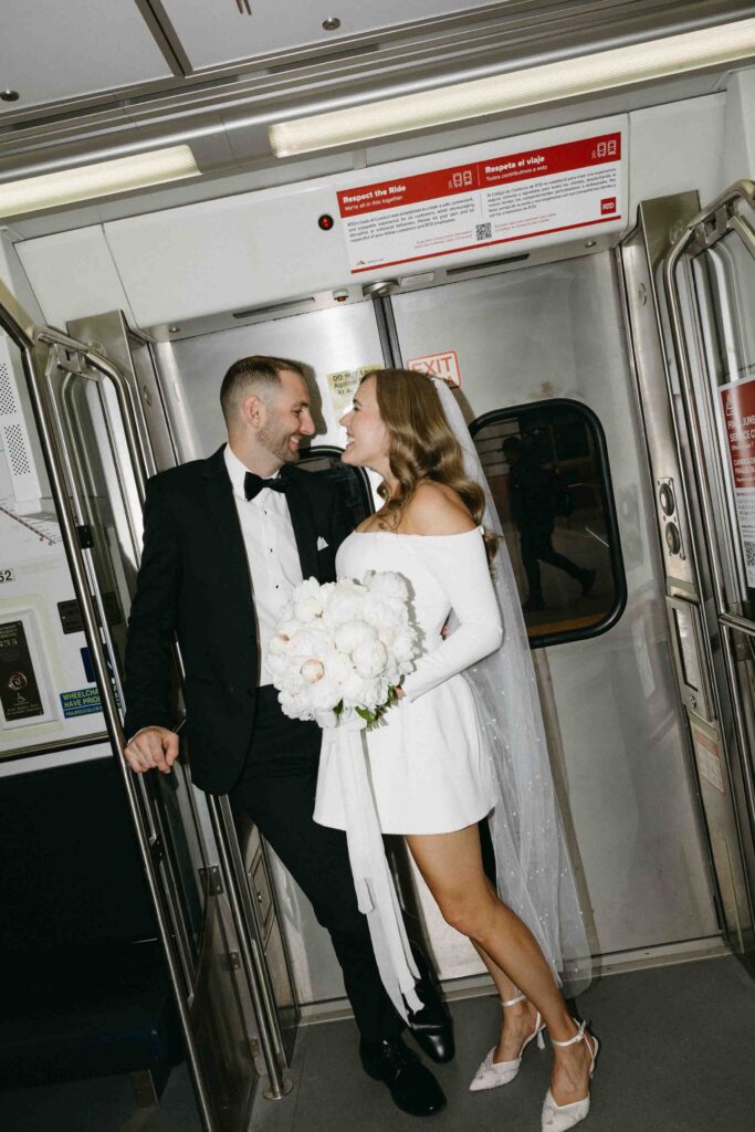 A couple rides Denver public transit after their self-solemnization ceremony.  